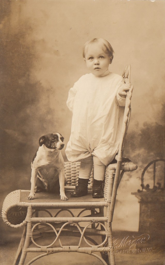 "D. Fleming Lucas and Trixie. From Will & Edna."  Studio photograph on postcard, 1920s.  